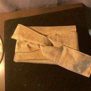 Tan bow clutch